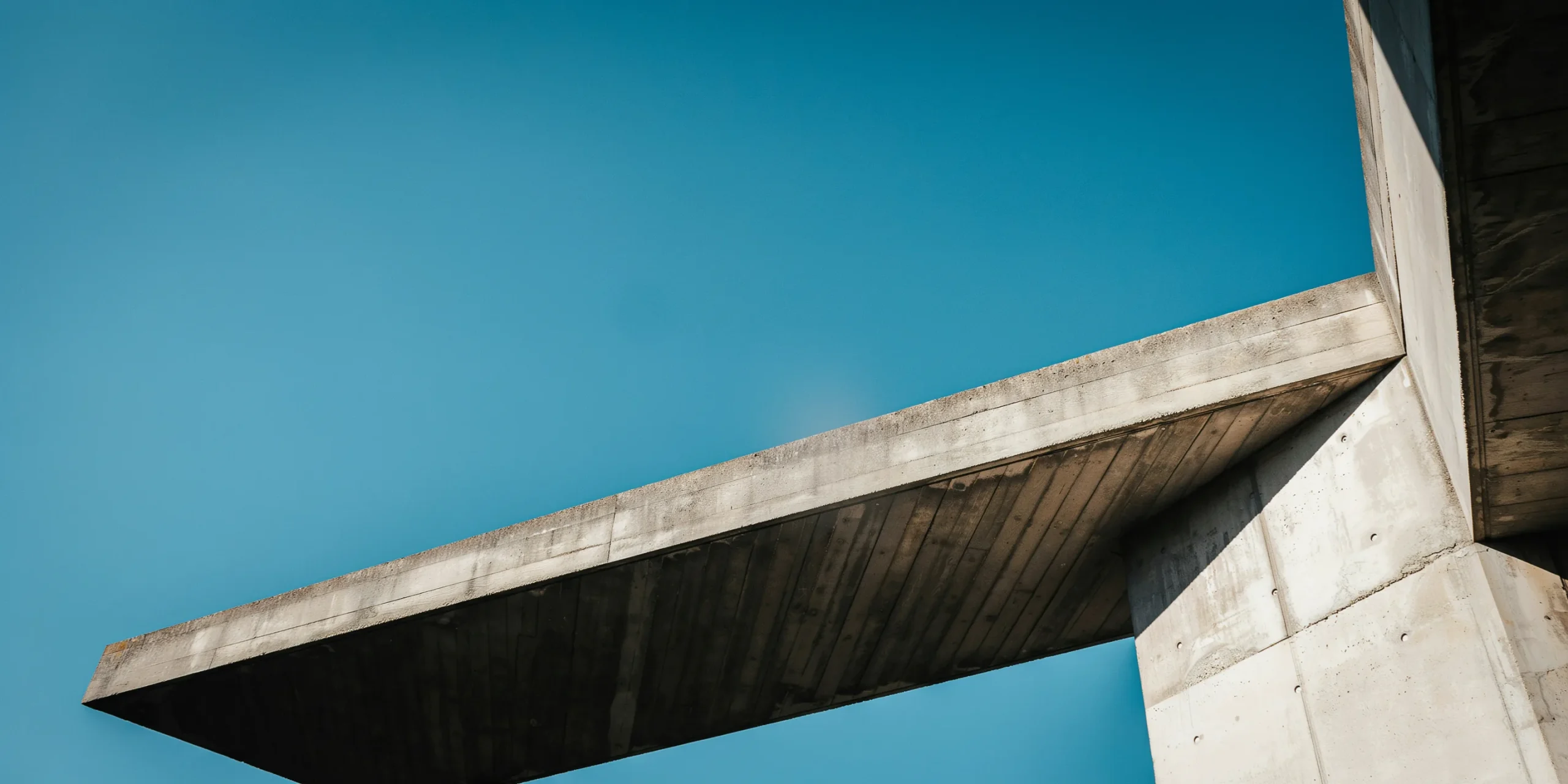Cantilevered concrete slab illustrating the structural freedom of concrete architecture