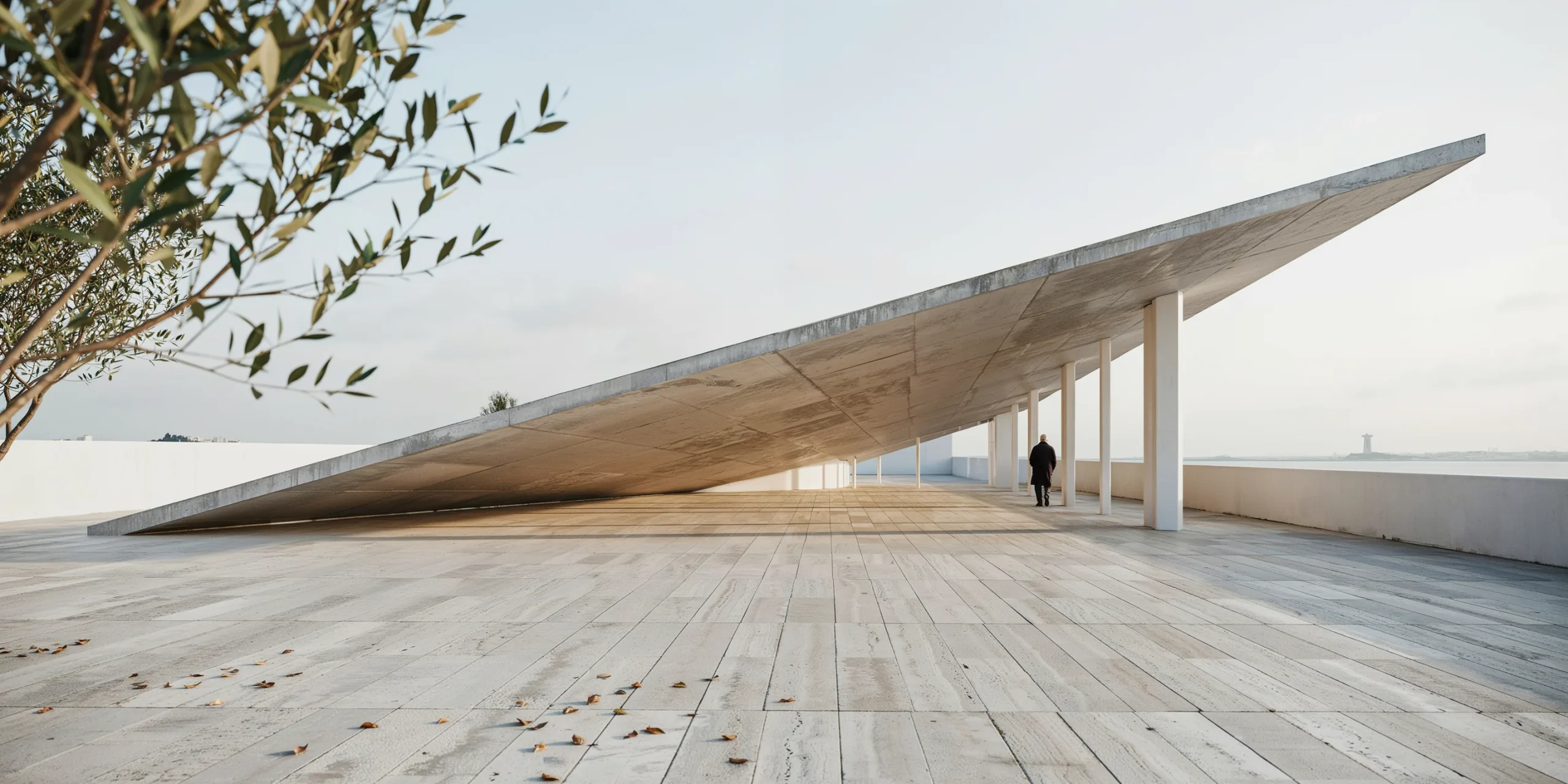 The thin concrete canopy of Álvaro Siza's Portuguese Pavilion spanning an outdoor plaza.